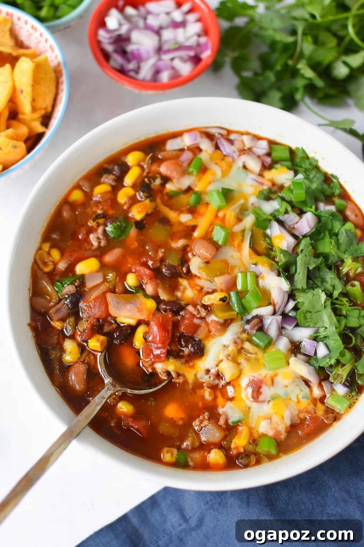 Hearty Crockpot Taco Soup 2 Slow Cooker Taco Soup Recipe with spoon in a bowl
