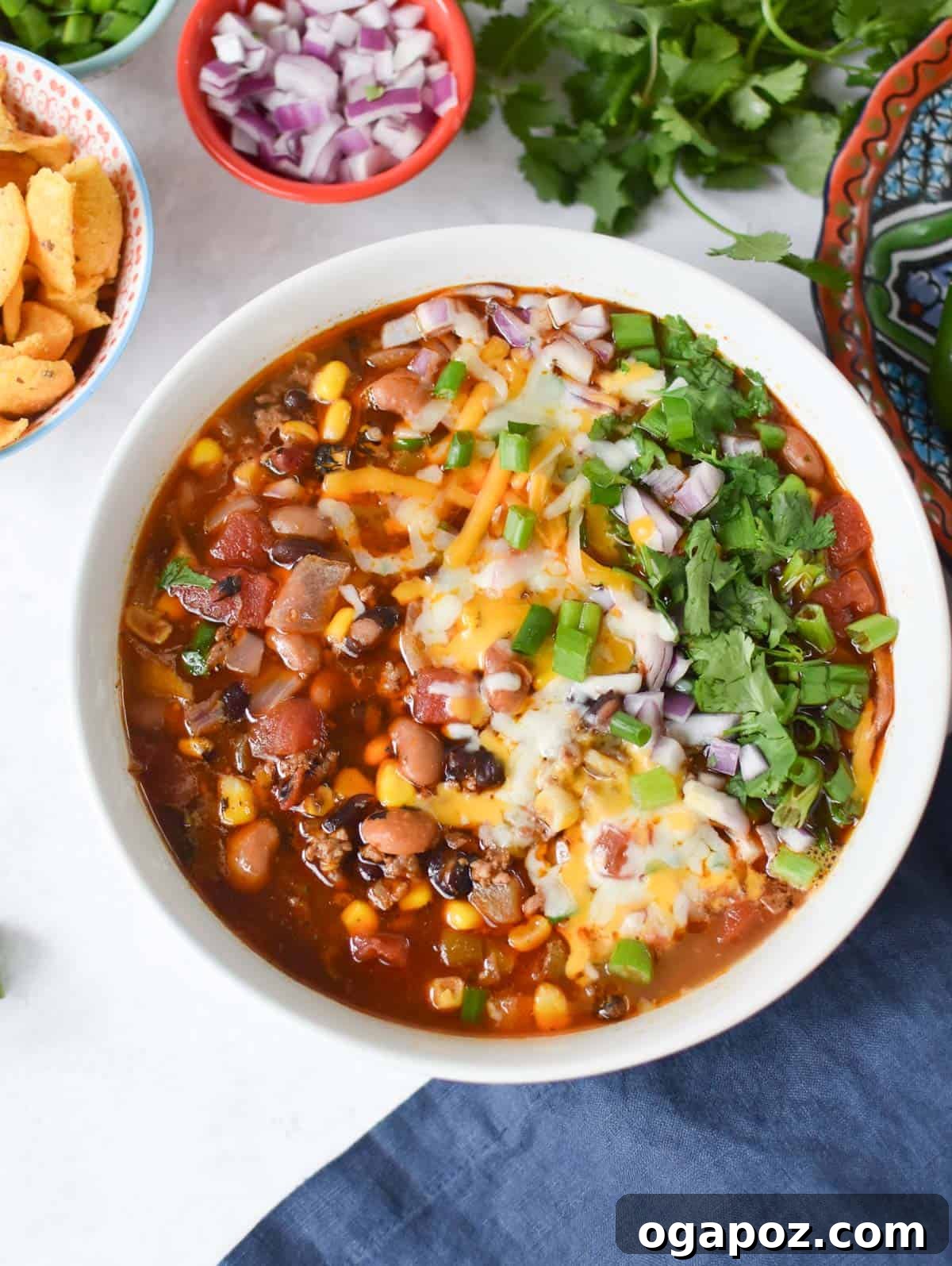 Hearty Crockpot Taco Soup 7 Slow Cooker Taco Soup Recipe served with a blue napkin
