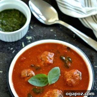 Spinach and Tomato Soup with pesto swirl