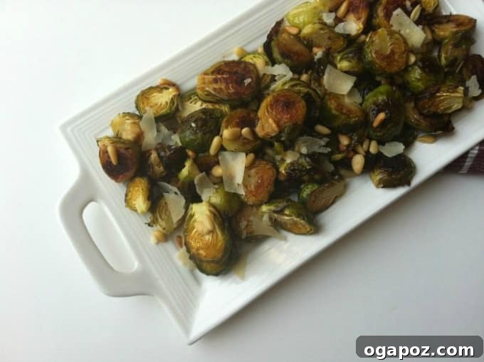 Caramelized Lemon Brussels Sprouts with Toasted Pine Nuts 2 Crispy Lemon Roasted Brussels Sprouts topped with pine nuts and parmesan