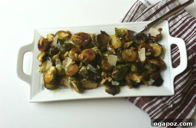 Caramelized Lemon Brussels Sprouts with Toasted Pine Nuts 5 Healthy Lemon Roasted Brussels Sprouts with pine nuts on a baking sheet