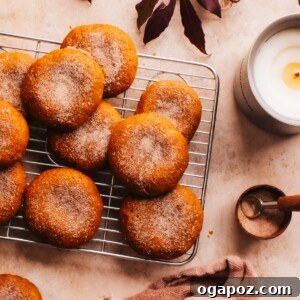 Soft Pumpkin Cookies on a fall tablescape, surrounded by autumnal decorations, emphasizing seasonal delight.