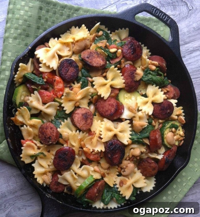 Hearty Smoked Sausage & White Bean Pasta 3 Close-up of Smoked Sausage, White Bean and Spinach Pasta with Toasted Pine Nuts
