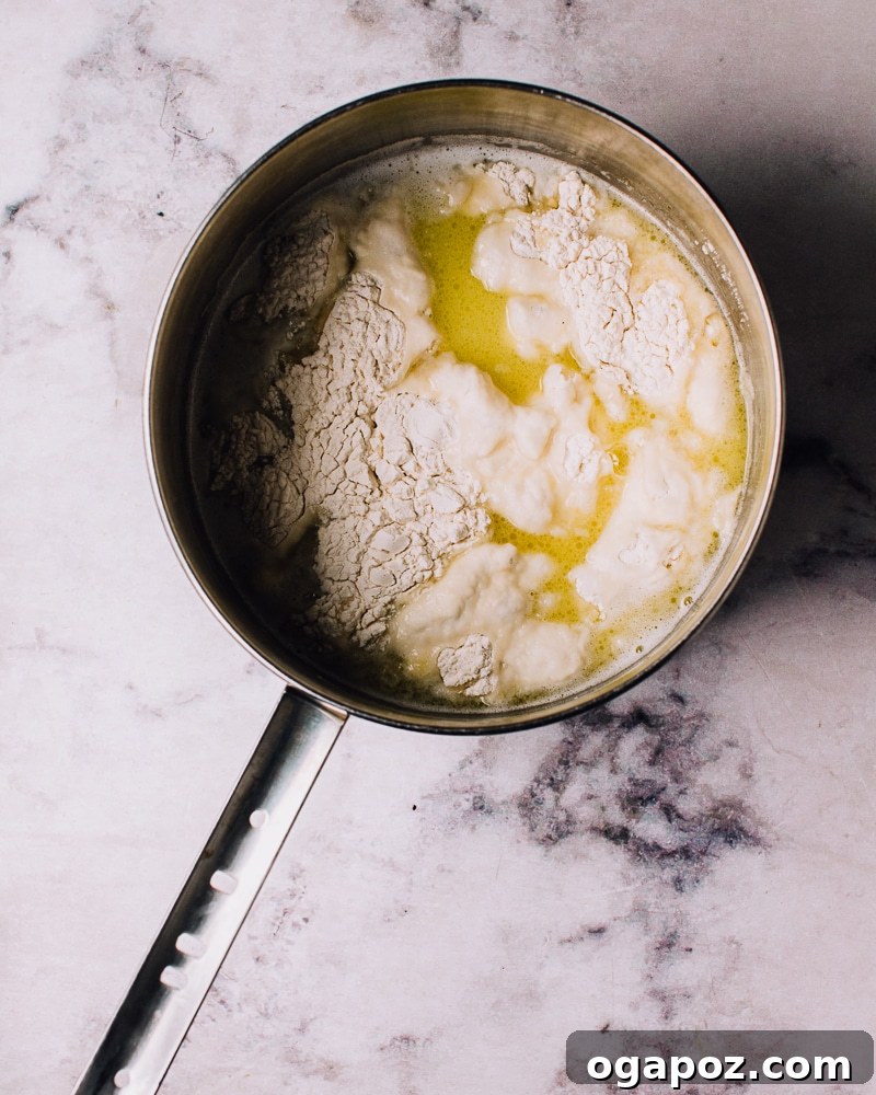 Airy French Delights 6 Flour just added to the hot liquid mixture for choux pastry.