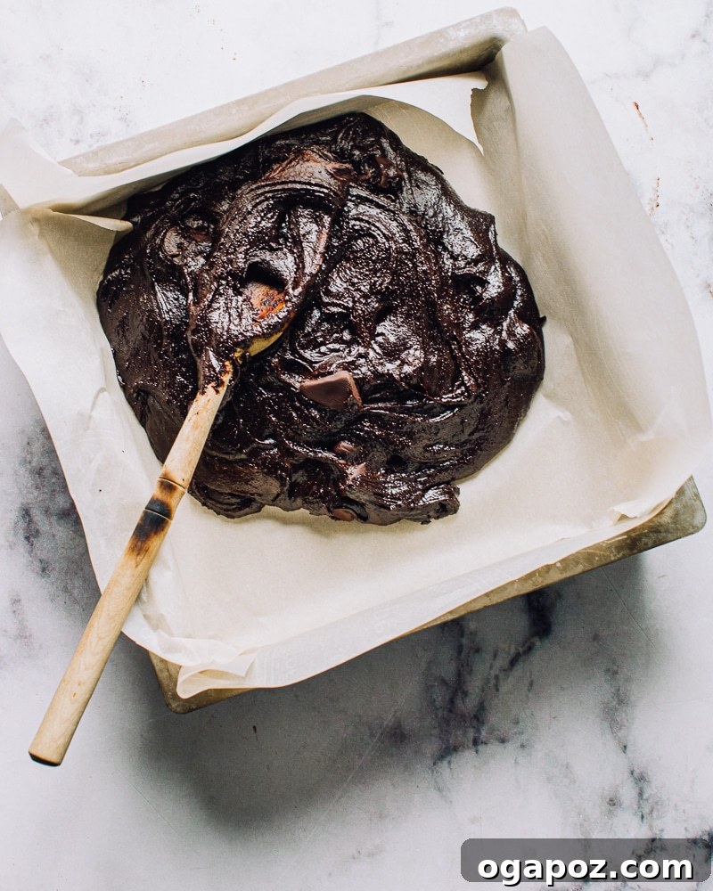 Fudgy Strawberry Swirl Brownies 6 Spread thick brownie batter into a parchment-lined baking pan