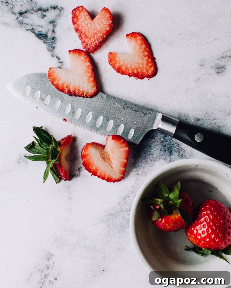 Fudgy Strawberry Swirl Brownies 9 Slice fresh strawberries into decorative heart shapes for topping