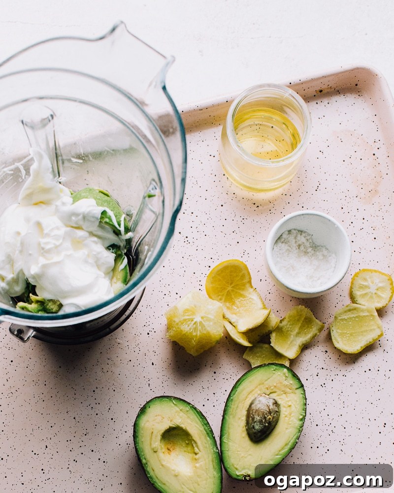 Velvet Avocado Crema 3 Avocado crema ingredients on a pan.