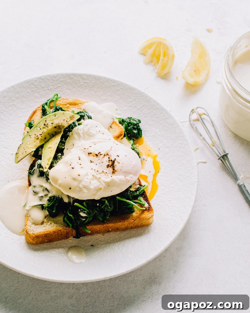 Close-up of the simple ingredients for lemon yogurt sauce on a white counter, highlighting freshness.