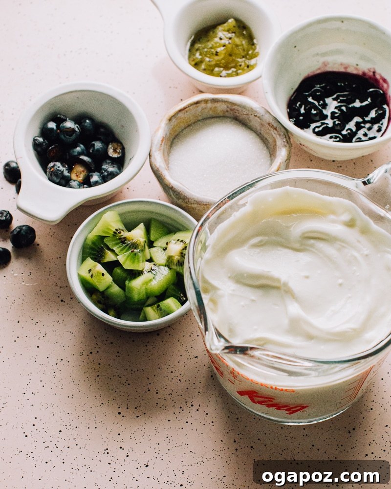Refreshing Yogurt Delights 3 Ingredients for Frozen Yogurt Bark laid out - Greek yogurt, jam, and fresh fruit.