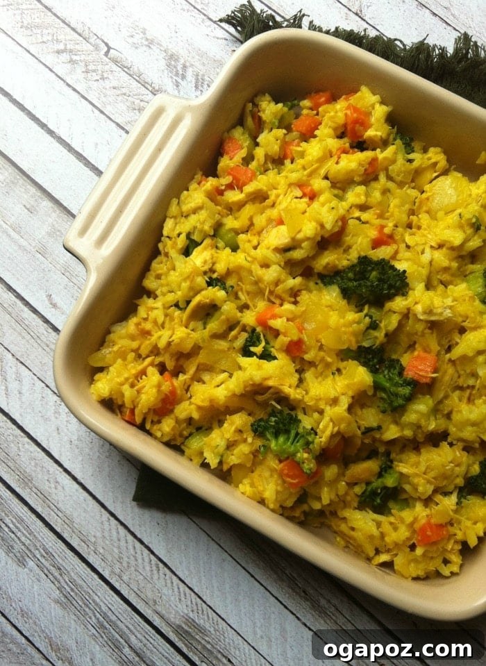 Delicious Curried Chicken and Rice Casserole in a baking dish, garnished and ready to be served.