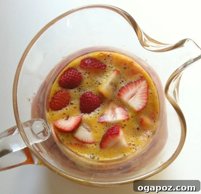Refreshing Strawberry Sangria 3 Close-up of Strawberry Sangria with sliced fruit