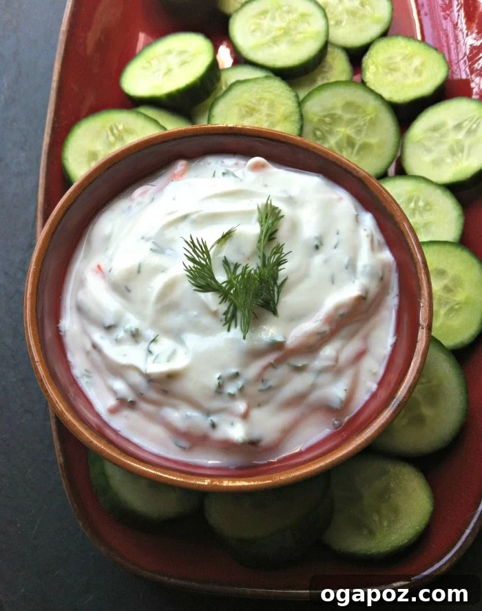 Tangy Dill Greek Yogurt Dip 6 A bowl of creamy dill Greek yogurt dip with fresh vegetables.