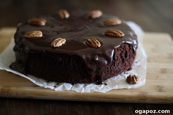 Ultimate Gluten-Free Chocolate Coconut Ganache Delight 2 Decadent Gluten-Free Chocolate Cake generously topped with luscious Coconut-Chocolate Ganache, a perfect dairy-free and almost Paleo dessert.