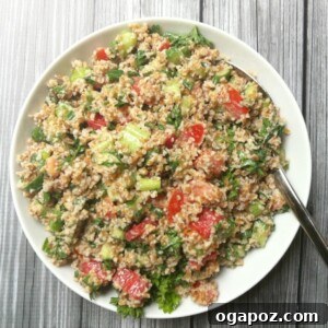 Vibrant Bulgur Salad with Cool Mint Yogurt Dressing 6 Vegetable Bulgur Salad with Mint Yogurt Dressing, garnished for presentation