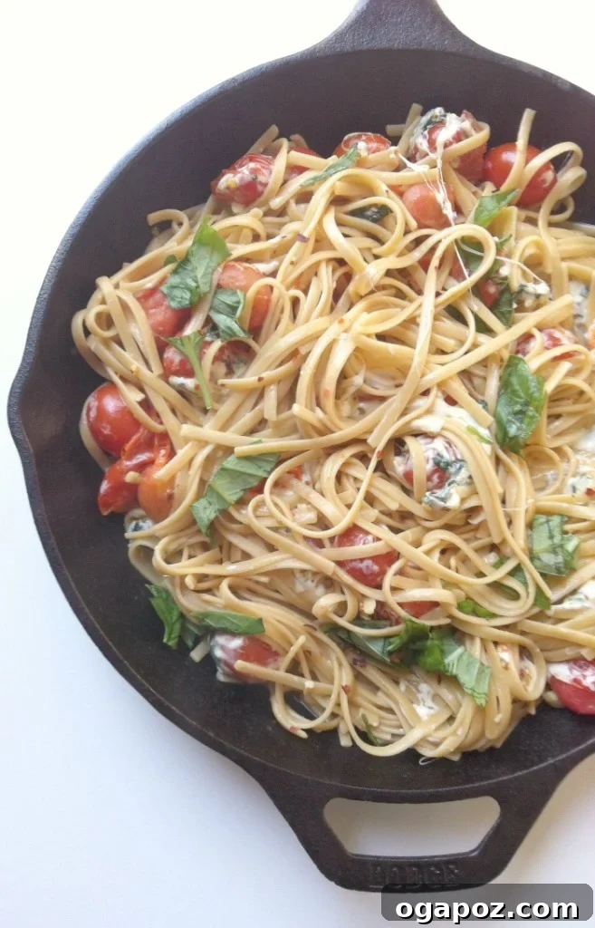 Speedy Caprese Skillet Pasta 3 Close-up of fresh mozzarella and basil in a Caprese Pasta Skillet