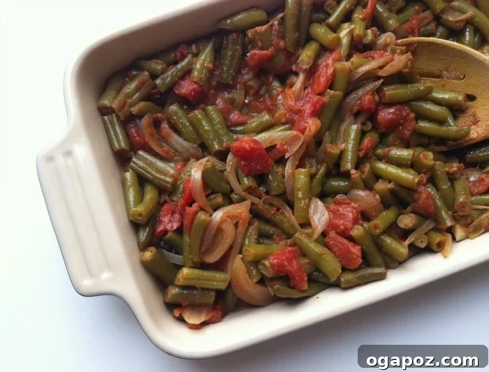 35 Vibrant Mediterranean Dishes 5 Lebanese Green Beans, tender green beans cooked in a rich tomato sauce with garlic and olive oil
