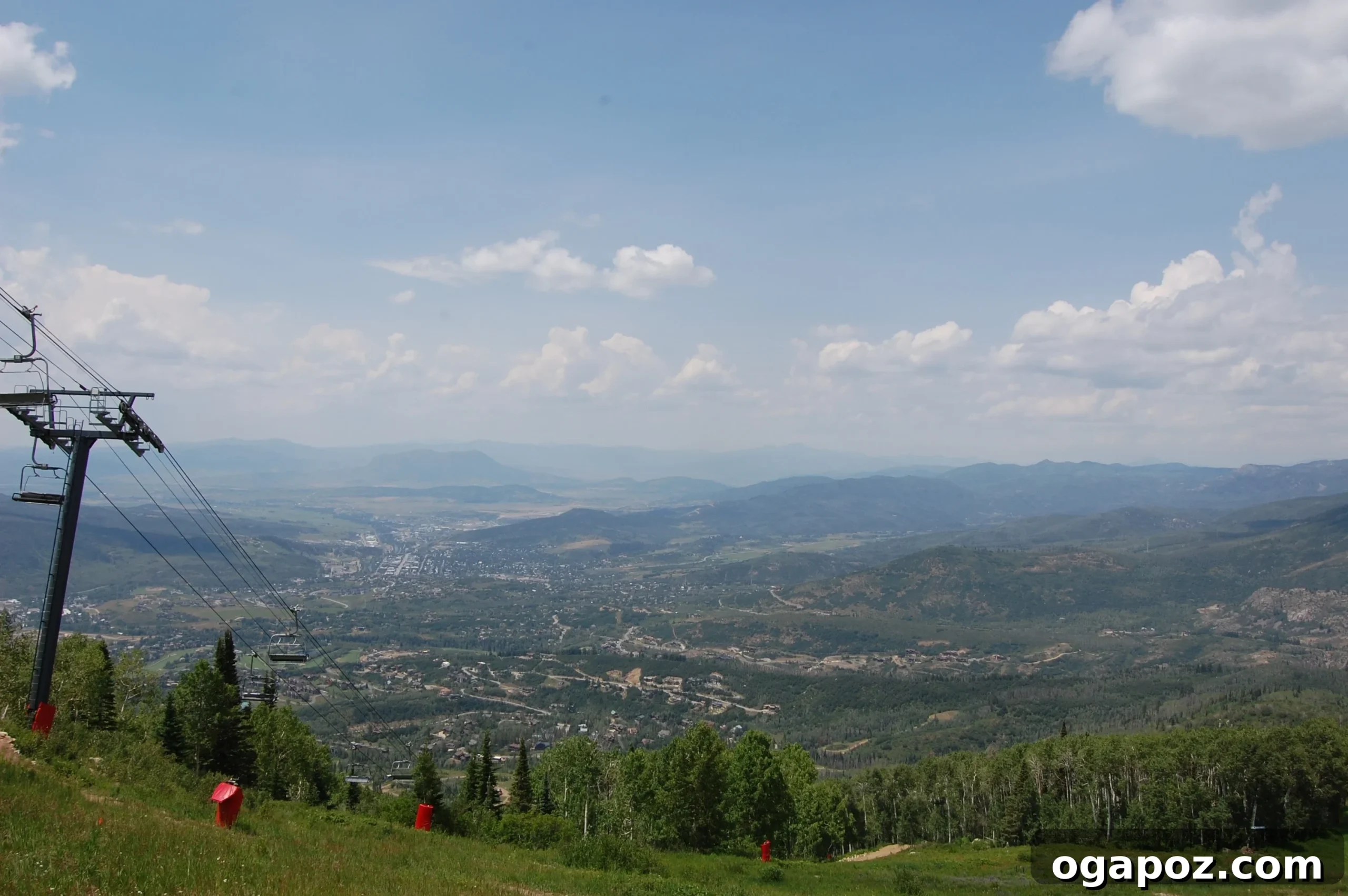 Hikers on a scenic trail in Steamboat Springs with vast mountain views