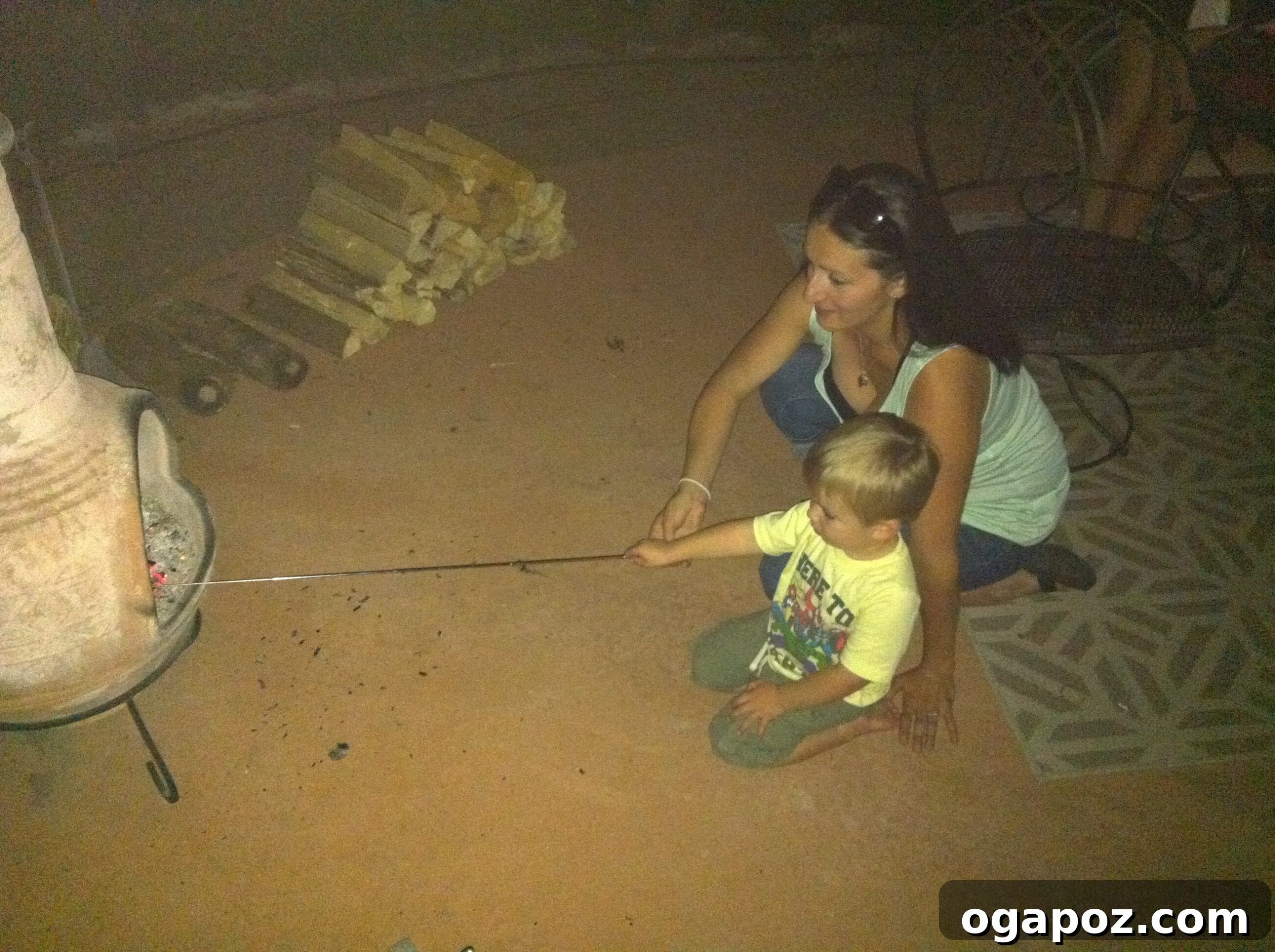 Denver Steamboat Springs Colorado Adventure 4 Julia and Will, a child, smiling by the warm glow of a Colorado campfire