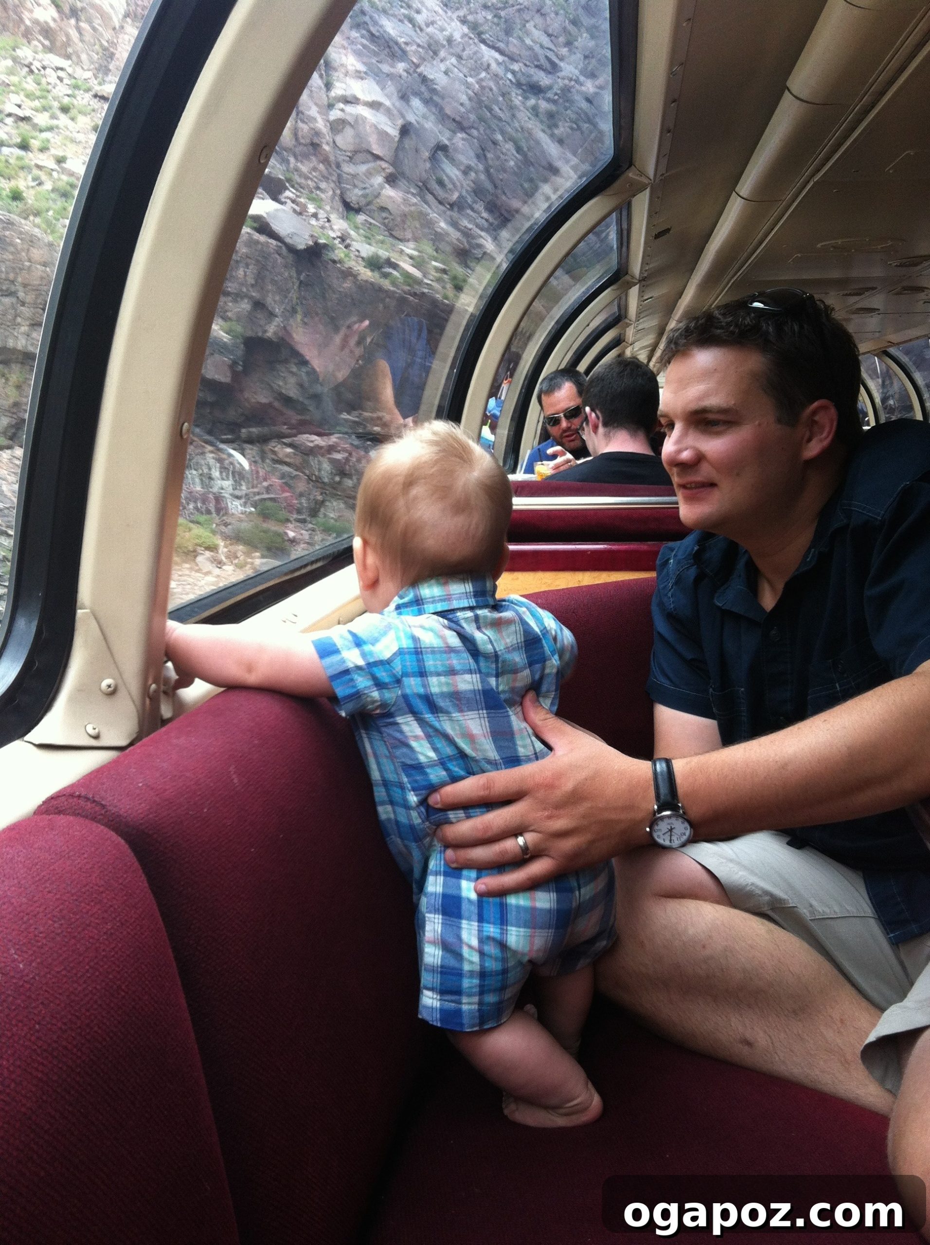 Denver Steamboat Springs Colorado Adventure 7 Child looking out the window during a scenic train ride in Colorado