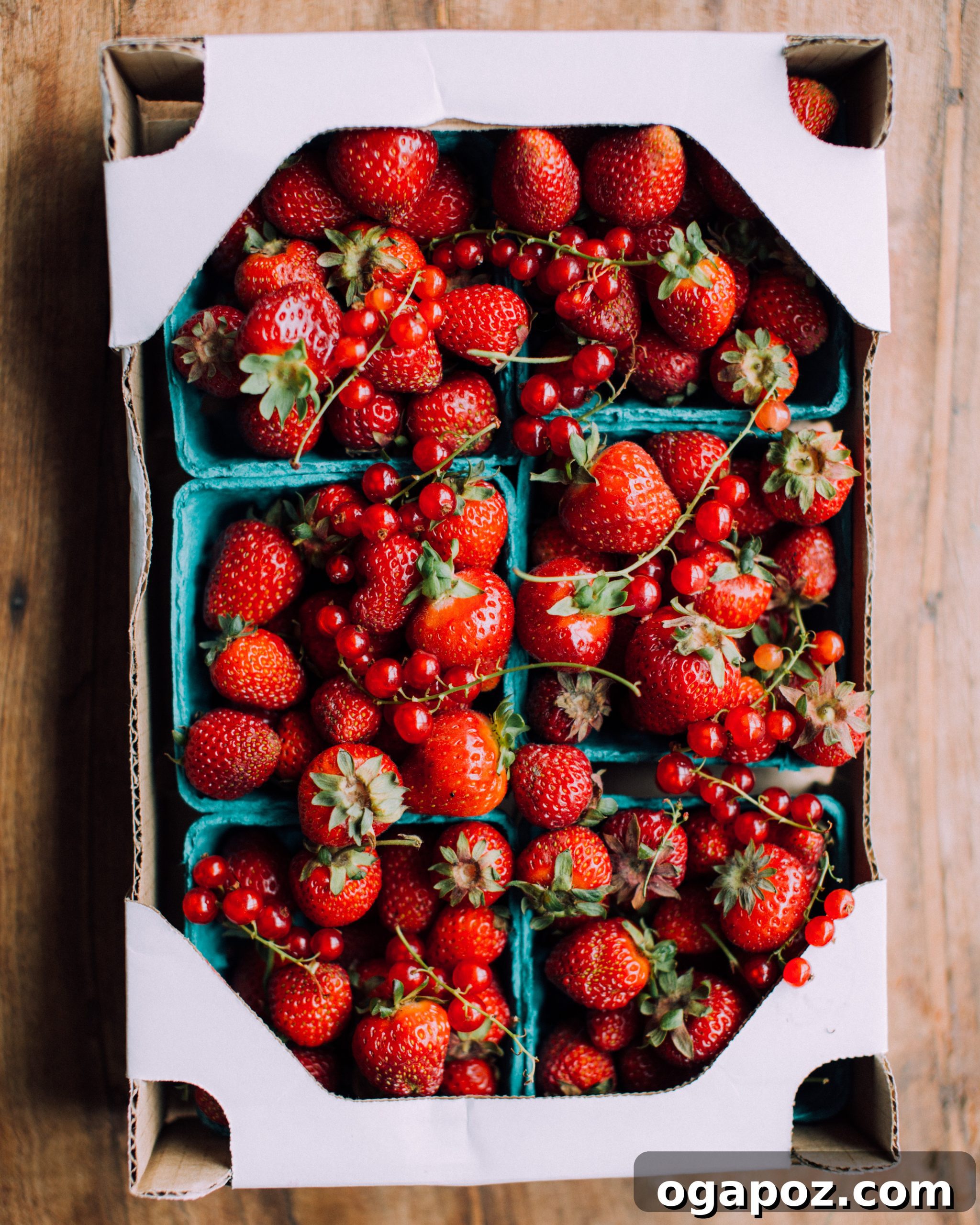 Sweet Strawberry Comfort 3 Close-up of fresh, vibrant strawberries in a bowl, ready for making strawberry cobbler.