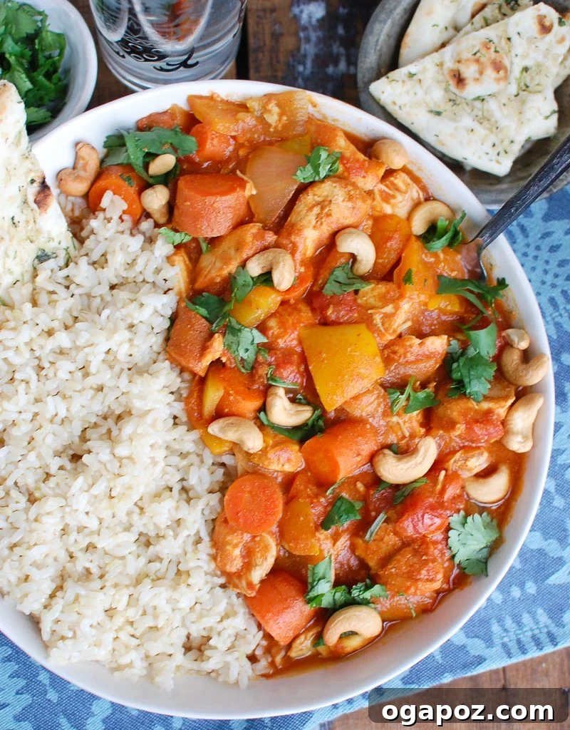 Effortless Slow Cooker Chicken Curry 4 Slow Cooker Coconut Curry Chicken with Spoon