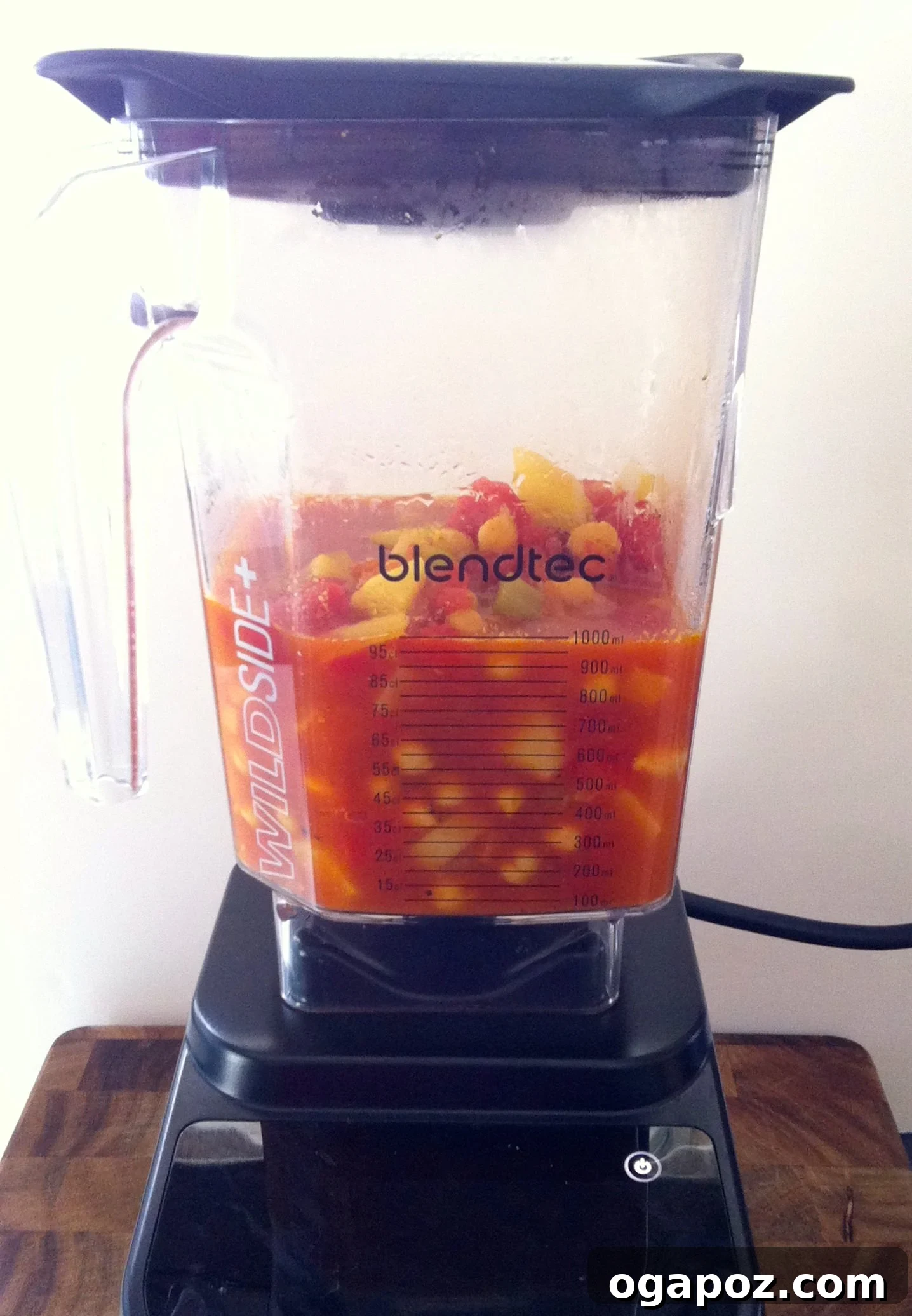 Aromatic Indian Chickpea Vegetable Soup 3 A modern, high-performance Blendtec blender on a clean kitchen counter, showcasing its sleek design and powerful presence.