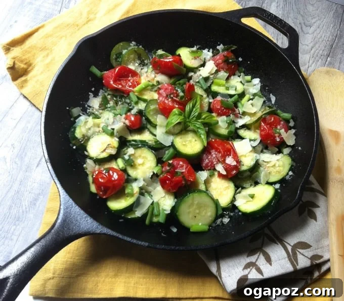 Vibrant Zucchini Tomato Basil Medley 5 Sauteed Tomato Basil Zucchini served in a bowl, garnished with fresh basil