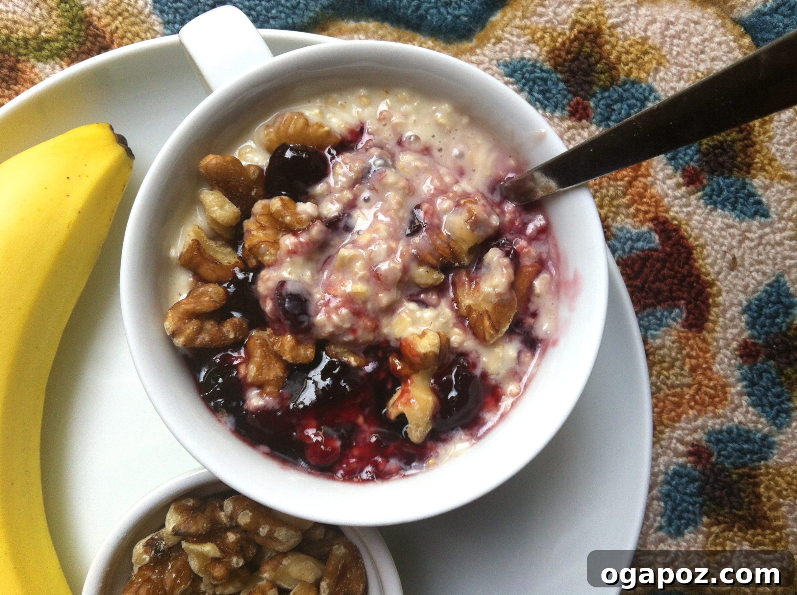 Easy Cherry Overnight Oats 3 Two jars of creamy Cherry Overnight Oatmeal on a rustic wooden surface, ready to eat
