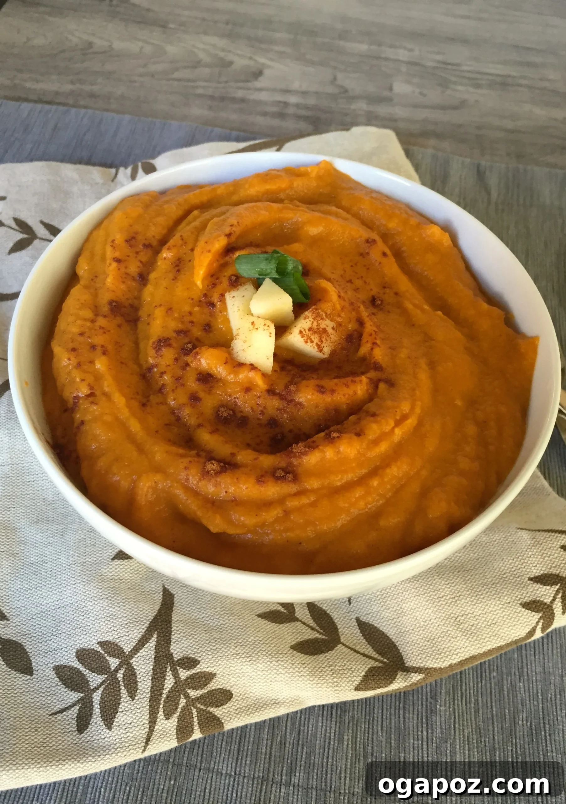 Spiced Harvest Butternut Sweet Potato Apple Soup 3 Close-up of fresh, wholesome ingredients laid out, including butternut squash, sweet potatoes, apples, onions, carrots, and celery, ready for soup preparation.