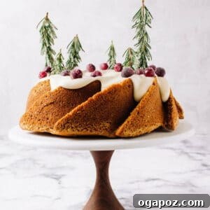 Close-up of a slice of Holiday Spice Bundt Cake, revealing its moist texture and rich spice blend.