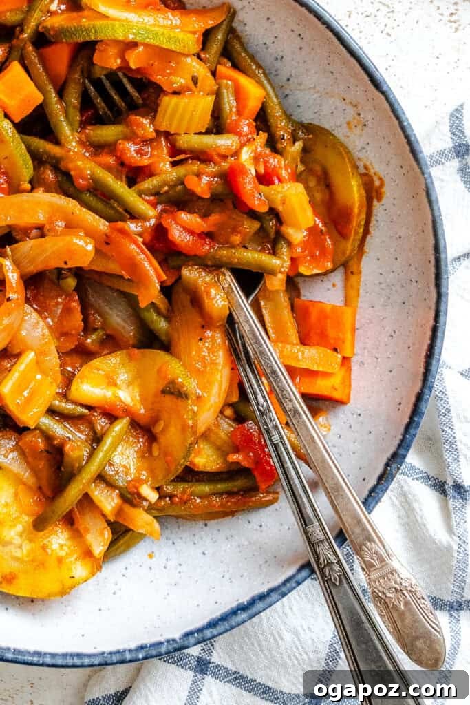 Lebanon's Garden Bounty 2 Lebanese Vegetables in a blue rimmed bowl with forks