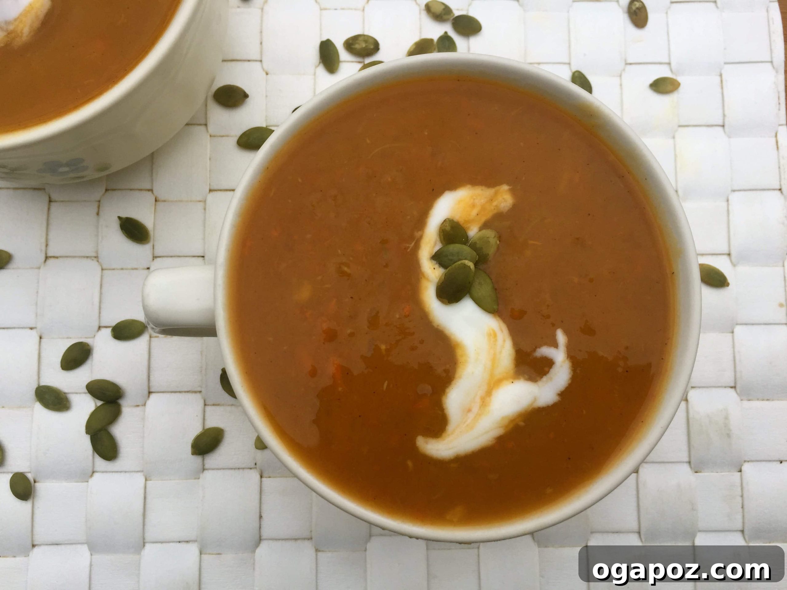 Creamy Butternut Squash Sweet Potato Slow Cooker Soup 3 Overhead view of a comforting bowl of Slow Cooker Butternut Squash Sweet Potato Soup