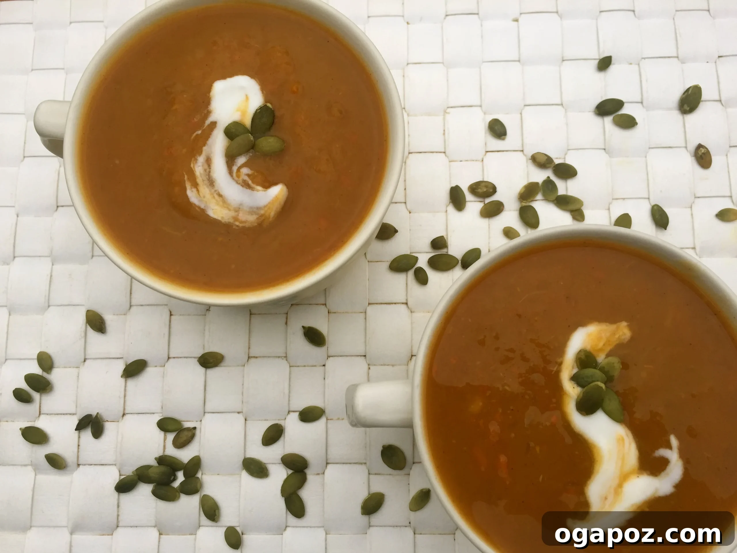 Creamy Butternut Squash Sweet Potato Slow Cooker Soup 4 Close-up of Slow Cooker Butternut Squash Sweet Potato Soup garnished with pumpkin seeds