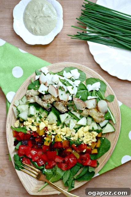 Color Your Plate 3 Rainbow Sabich Salad with Spicy Tahini Dressing features roasted eggplant, eggs, and colorful vegetables