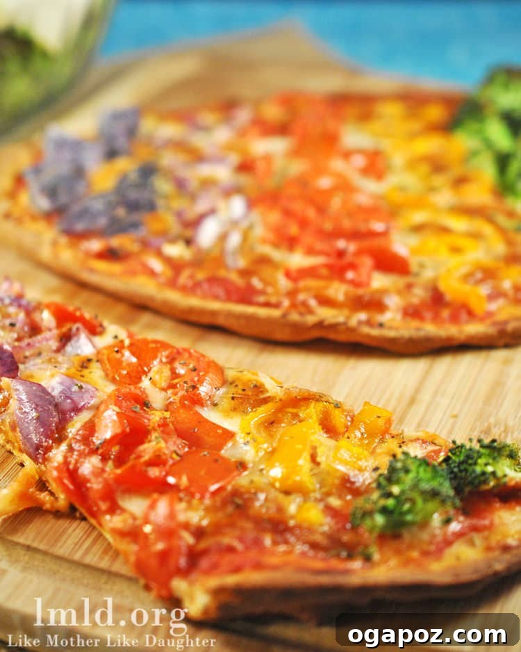 Color Your Plate 26 Rainbow Vegetable Pizza, topped with an array of colorful vegetables
