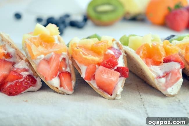 Color Your Plate 7 Mini Fruit Tacos filled with colorful berries and kiwi