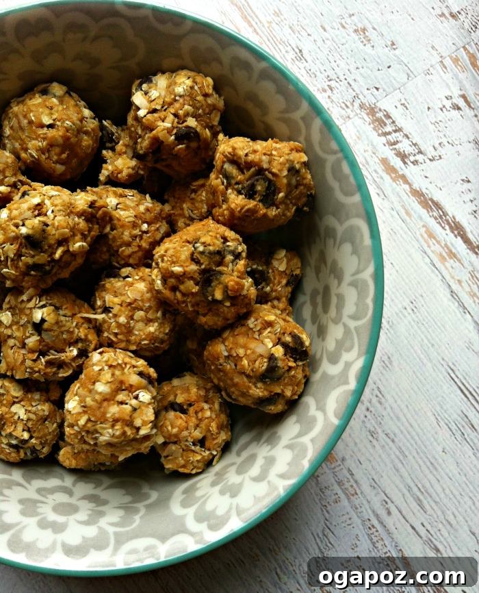 A stack of Peanut Butter Coconut Oatmeal Bites, demonstrating a perfect healthy grab-and-go snack.