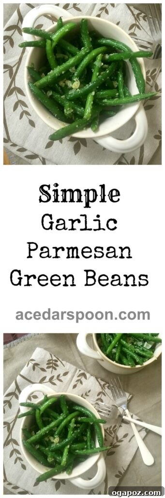 Effortlessly Delicious Garlic Parmesan Green Beans 8 A close-up shot of crispy, golden-brown Simple Garlic Parmesan Green Beans on a white plate, garnished with fresh herbs, ready to be served.