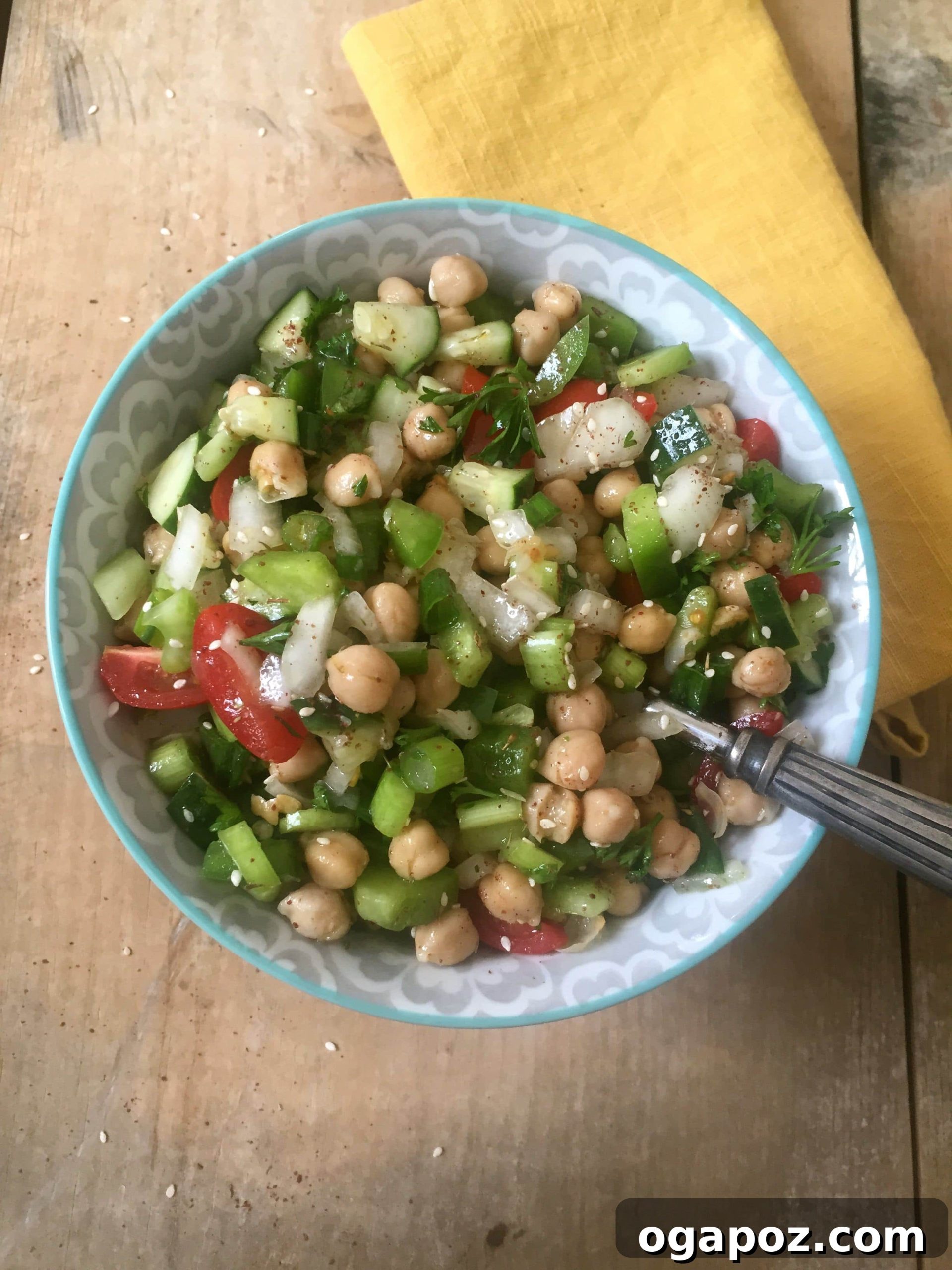 Wholesome Chickpea Chop 2 Vibrant Chopped Chickpea Salad in a bowl, ready to be served.