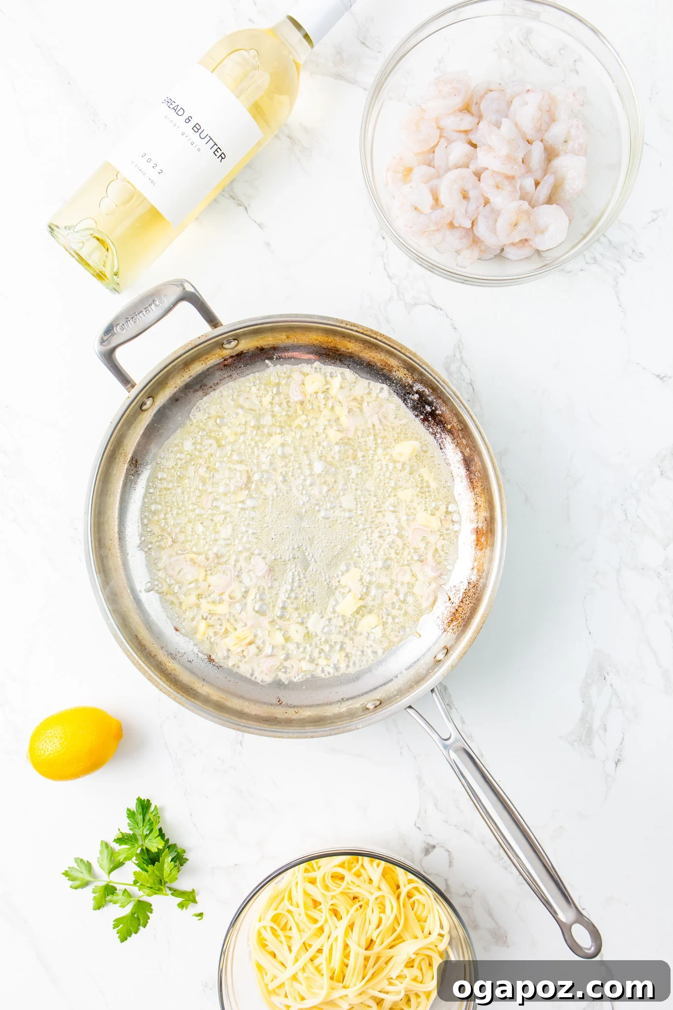 Sun-Kissed Lemon Garlic Shrimp Linguine 8 Onions being sautéed in a skillet, part of the Lemon Garlic Shrimp Pasta recipe.