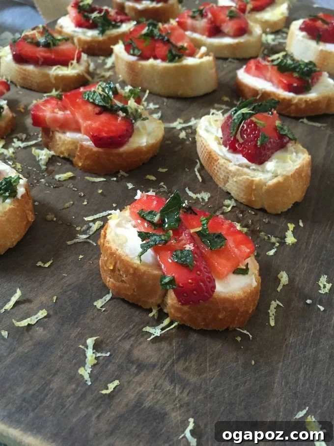 Fresh Strawberry Mint Mascarpone Crostini with Lemon Honey Drizzle 3 Close-up of Strawberry Mint Crostini beautifully arranged on a tray