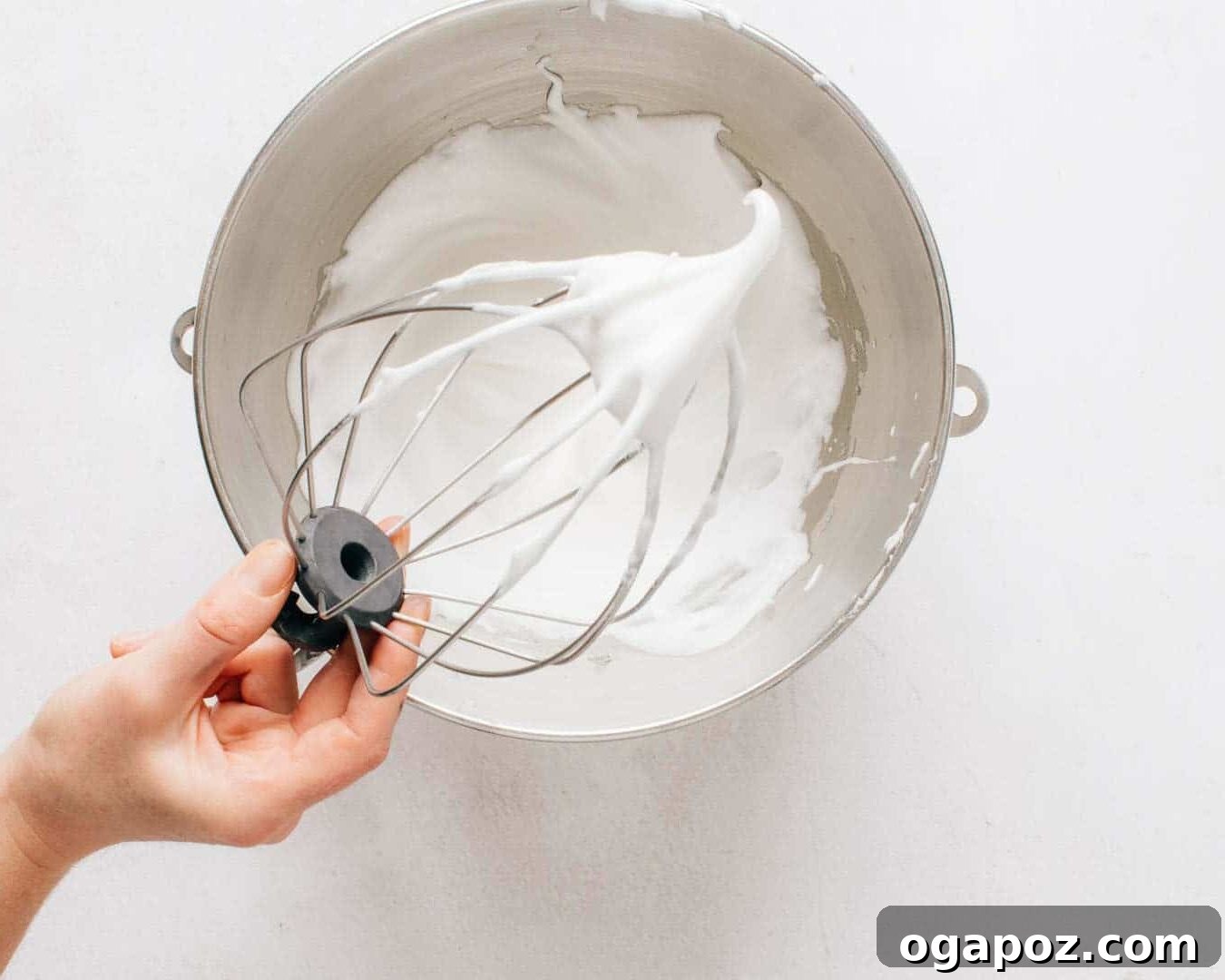 Decadent Chocolate Swirl Cake 4 Egg whites whipped to medium-stiff peaks in a stand mixer.