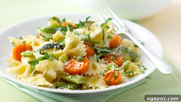 Pasta Primavera Bow-tie pasta mixed with colorful primavera vegetables and parmesan cheese