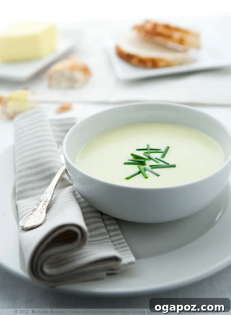Potato Leek Soup Smooth and creamy Easy Potato Leek Soup, garnished with fresh herbs.
