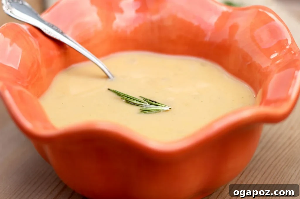 Roasted Garlic and Rosemary White Bean Soup Hearty Roasted Garlic and Rosemary White Bean Soup, rich in flavor and aroma.