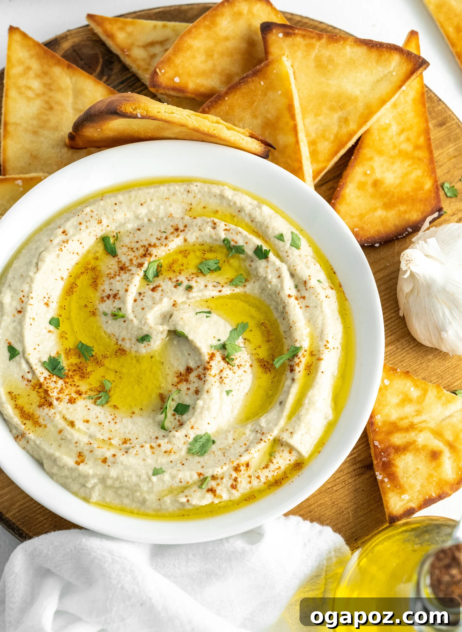 Smoky Roasted Eggplant Dip 4 A serving of Baba Ghanoush in a white bowl, ready to be enjoyed.