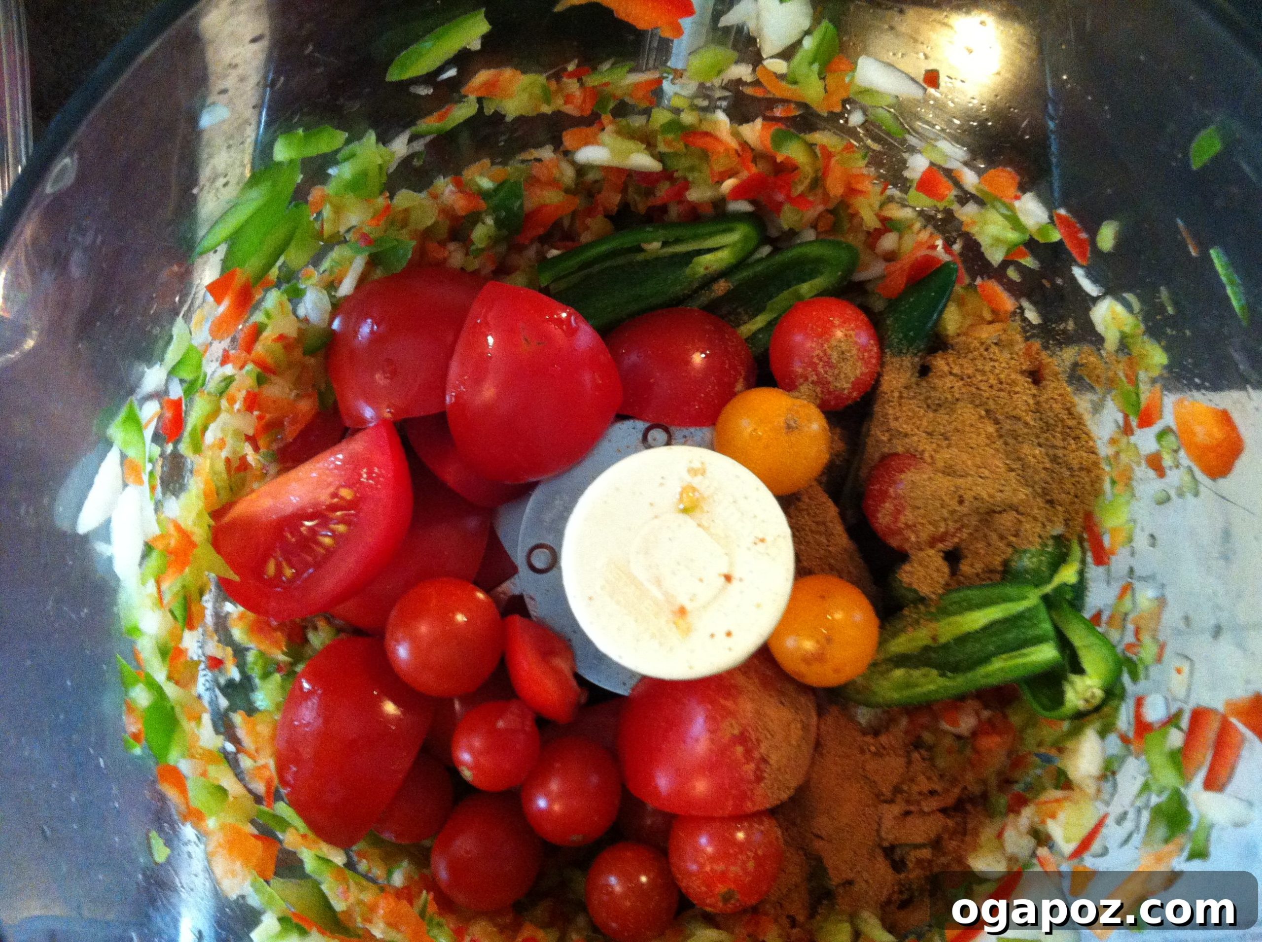 IMG_4118 Tomatoes and peppers in a food processor, ready to be blended into Kickin' Salsa.