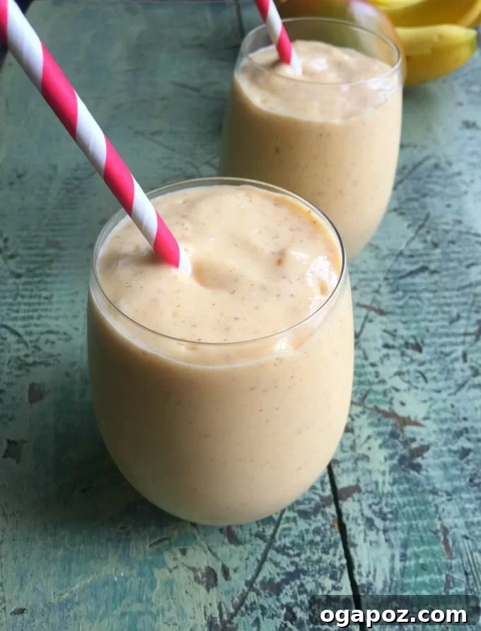 Paradise Yogurt Blend 2 Vibrant Tropical Yogurt Smoothie in a glass, ready to be enjoyed