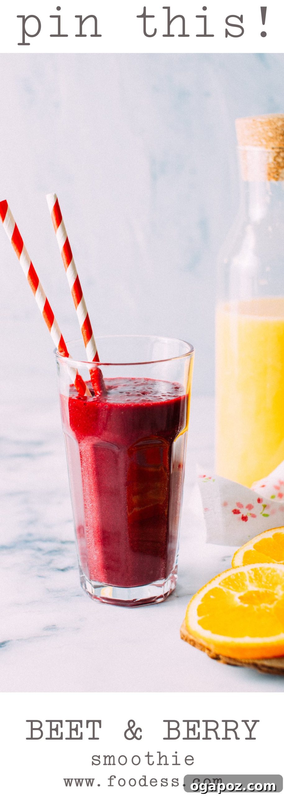 Vibrant Beet Berry Elixir 6 Two glasses of cherry-beet smoothie, one garnished with a cherry, next to a cutting board with chopped beets, whole cherries, and oranges.