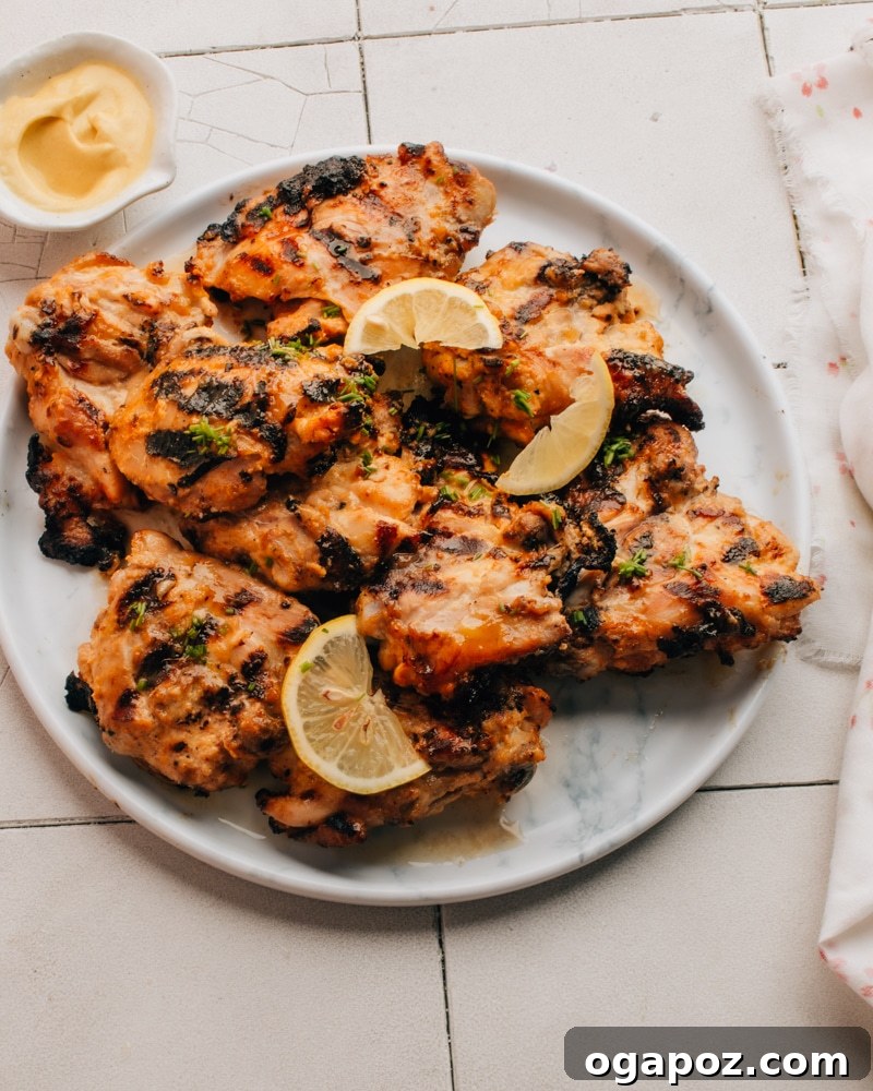 Chargrilled Honey Mustard Thighs 2 Grilled Honey Mustard Chicken on a plate, ready to be served.